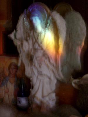 rainbow on archangel gabriel statue